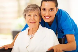 An elderly woman and a nurse